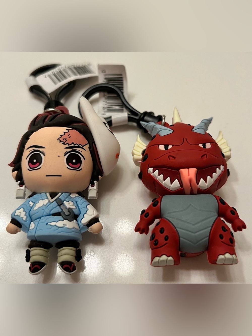 Tanjiro Kamado (Final Selection Outfit) x Titanosaurus (Exclusive A) Bag Clips